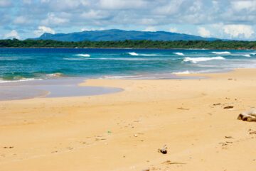 View on the Ujung Kulong National Park towards the West. This beach lies on the southern side of the isthmus of Ujung Kulong National Park, Java, Indonesia.