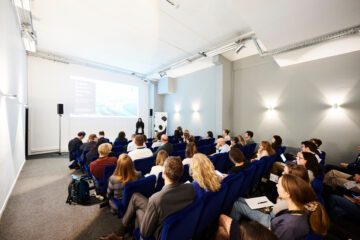 Persons seated at the European Business on Biodiversity Forum WWF France